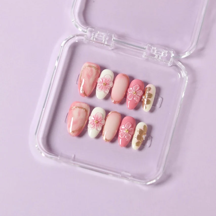 Blush Floral press-on nails in a clear case